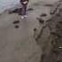 Abandoned Road To Flooded Village Dips Into Its Watery Grave