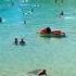 People Enjoying The Calming Effects Of The Balearic Sea In Autumn In Mallorca 28ºC 13 10 23