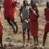 Jumping Against A Maasai Warrior