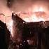 Firefighters And Residents Battle Fire In Cape Town Shack Dwellings