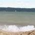 Girl Using Raft On Lake Michigan Pulled From Shore By Wind