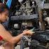 Versatile Girl Repairing Agricultural Machinery And Replacing Inner Tubes