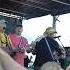 Jimmy The Parrots Performing Sweet Caroline At The Jimmy Buffett Tailgate Party