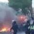 Chaotic Riot Scene With Fire And Tear Gas Bombs