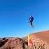 Jumping Over A Canyon On A Mountain Bike