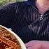 GRANDMOTHER BAKES KARABAKH BREAD IN THE FOREST