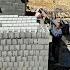 Architectural Art In Nomadic Life Building A Water Storage Source And Covering The Roof With Blocks