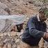 Iran Nomadic Life Planting A Tree On A Rainy Day In The Mountains