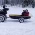 4 Wheeling In The Snow Pulling A Sled And Wagon