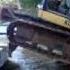 Loading Excavator Onto Barge