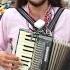 A Colombian Guy Is Performing A Folk Ukrainian Song In The Middle Of Bogota