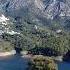 Flying A DJI Drone Istán Lake Breathtaking View With The La Concha Mountain As A Backdrop