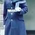 Boy Dressed As British Guard Salutes Windsor Castle Soldiers