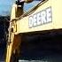 Excavator Uses Tree As A Paddle To Move Barge